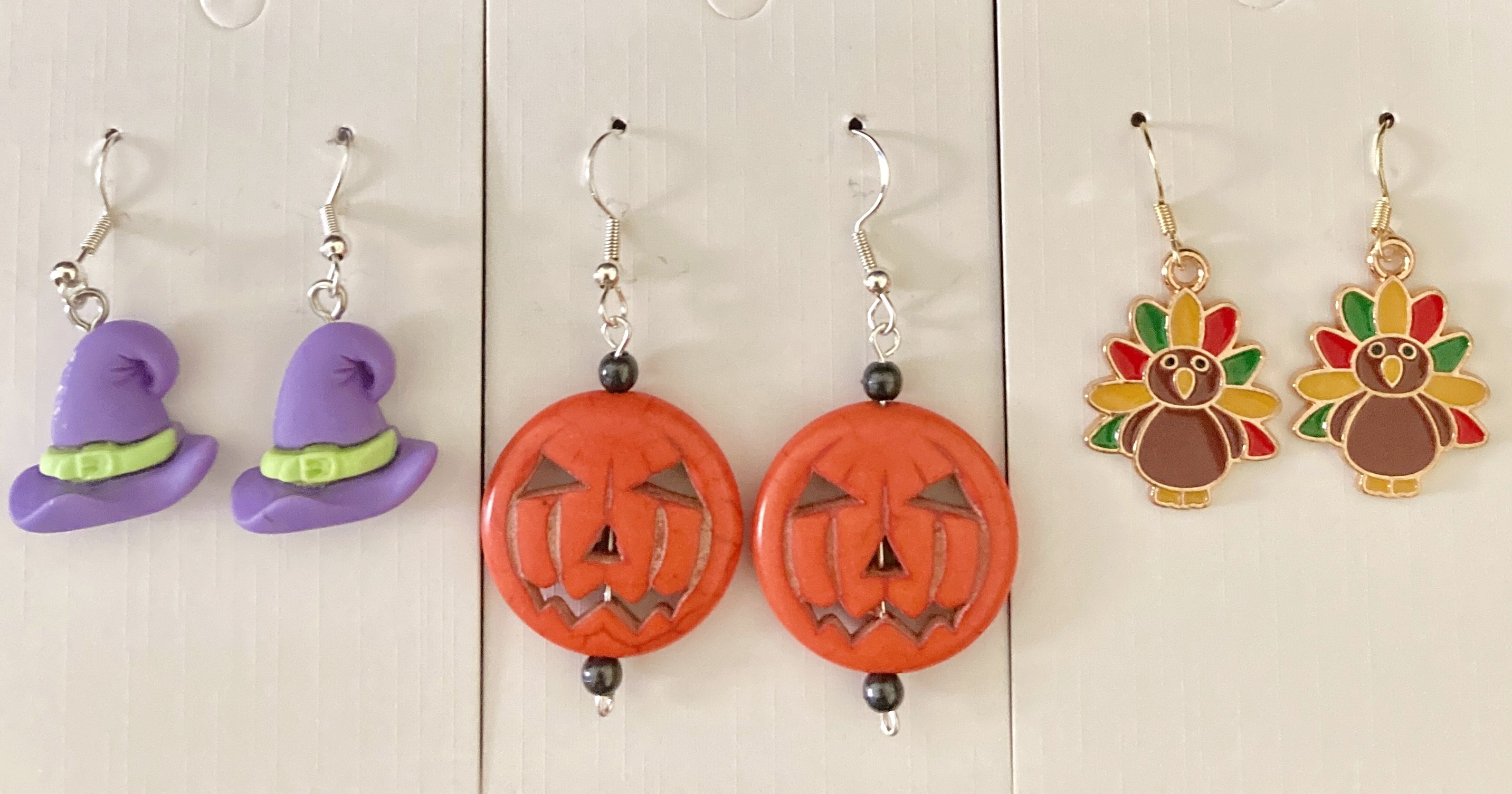 Two pair of Halloween Pierced earrings, & One pair of Thanksgiving Turkey Earrings.